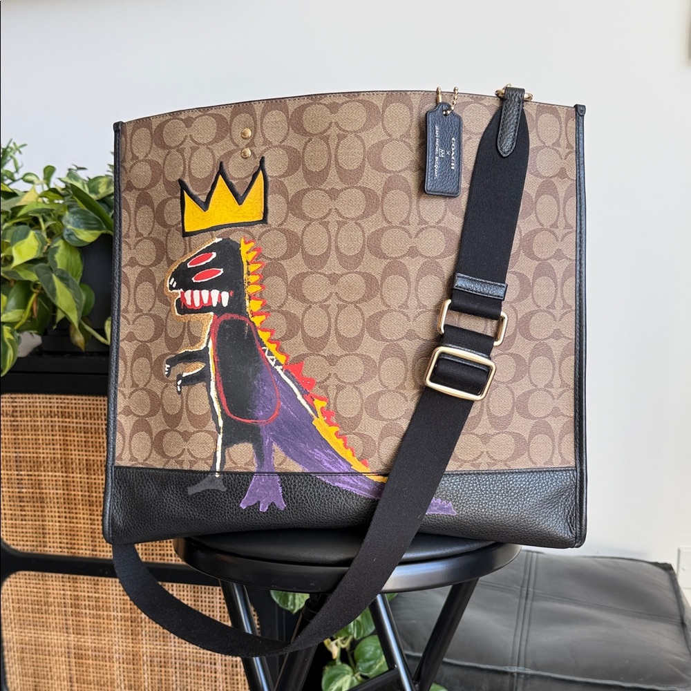 Coach x Basquiat tote Bag with Dinosaur Art handles and shoulder strap